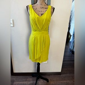 Neon green dress. BCBgenerations dress. Size 8. Slightly torn on the bottom.